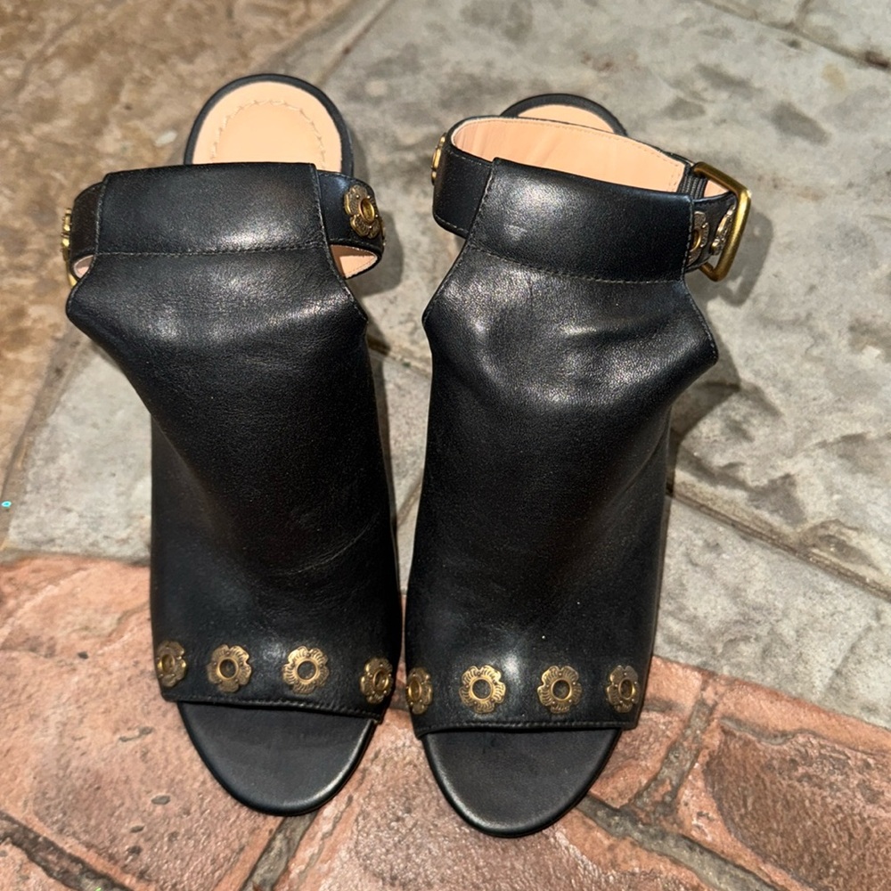 Coach Heels.